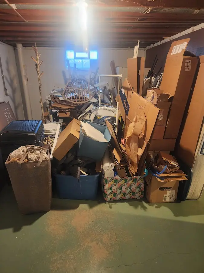 Roll-off dumpster container at job site for Yard Waste Dumpster Rental in Broadmoor